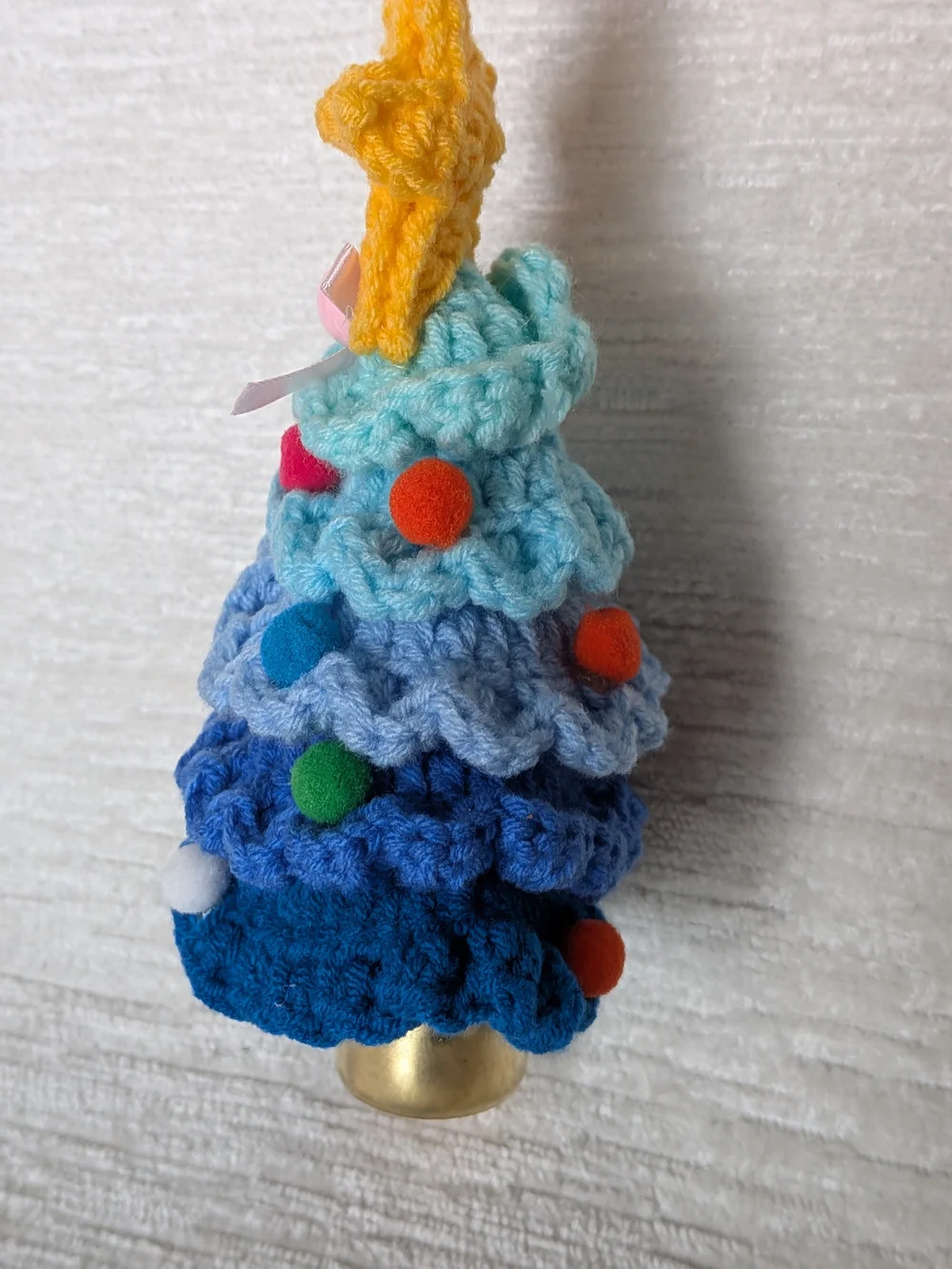 Crocheted Blue Layered Tree Ornament with Yellow Star And Bell